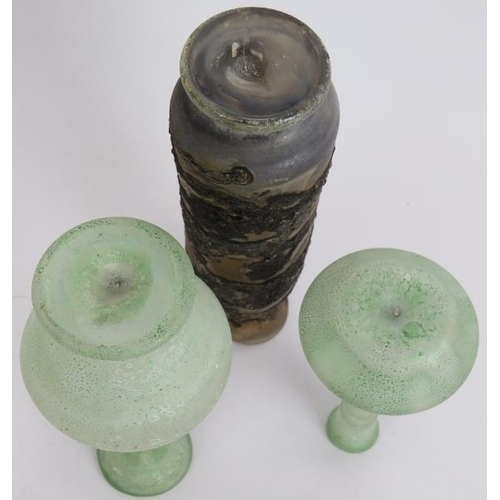 131 - Three hand blown Roman style glass flasks, one with handle. Tallest 19cm. (3).
Condition report: No ... 