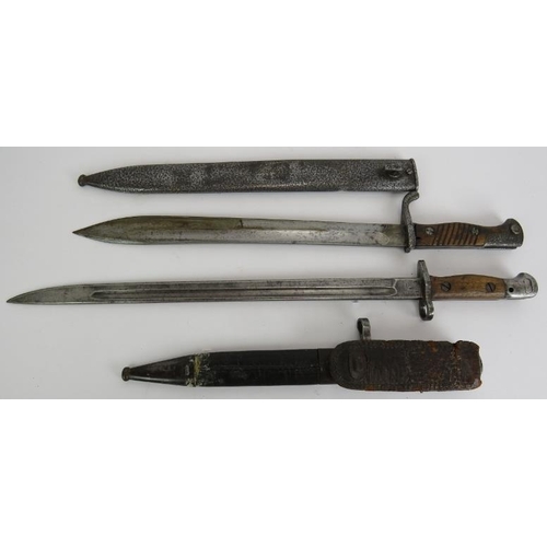 140 - A British 1907 model bayonet by Sanderson Bros, a German Alex Koppel bayonet with steel scabbard and... 