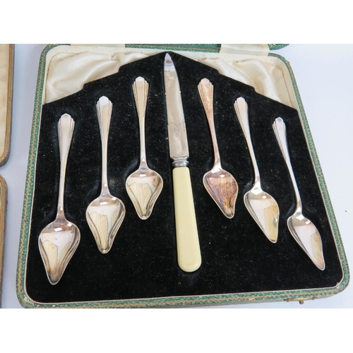 142 - A quantity of silver plated cutlery including a boxed grapefruit set, tea spoons and knives, a three... 