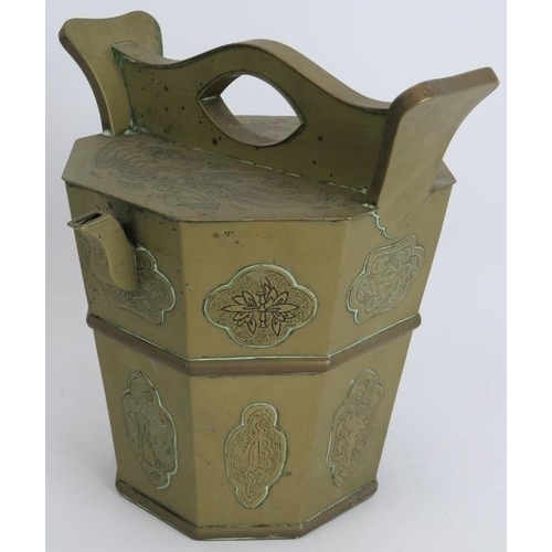 144 - An octagonal brass Chinese tea pail tea pot with engraved decoration and an Indo Persian chased Jard... 