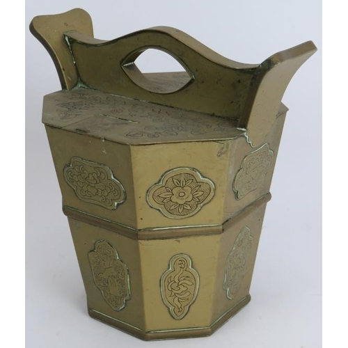 144 - An octagonal brass Chinese tea pail tea pot with engraved decoration and an Indo Persian chased Jard... 