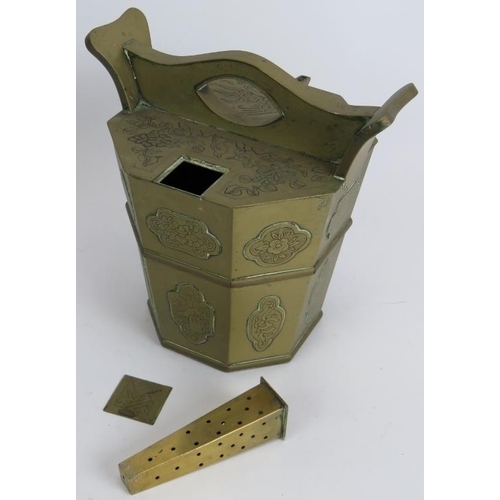 144 - An octagonal brass Chinese tea pail tea pot with engraved decoration and an Indo Persian chased Jard... 