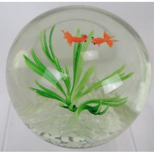 147 - A collection of 15 glass paperweights of various design including goldfish, bees, birds and shamrock... 