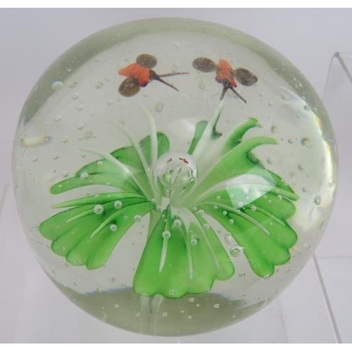 147 - A collection of 15 glass paperweights of various design including goldfish, bees, birds and shamrock... 