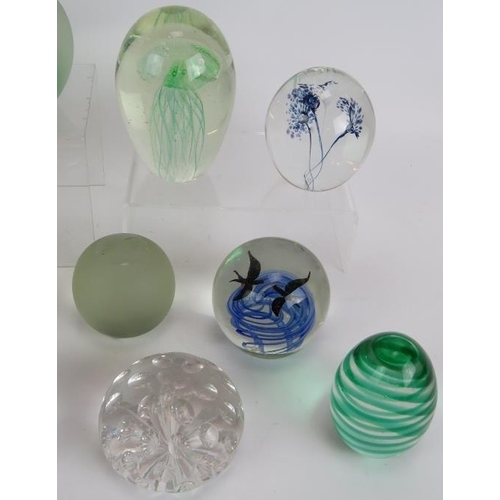 147 - A collection of 15 glass paperweights of various design including goldfish, bees, birds and shamrock... 