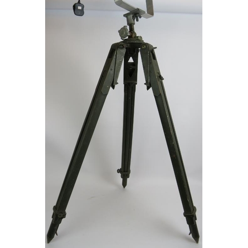 153 - An aluminium PAR 64S theatre light with green lens mounted on a vintage green wooden adjustable trip... 