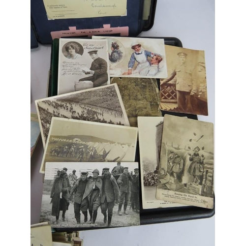 154 - A collection of mainly WWI era postcards and photos including military and European and British view... 