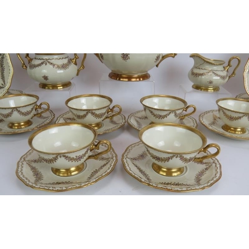 156 - A 21 piece Rosenthal Chippendale porcelain tea service hand decorated with gilt swags. Signed R Chio... 