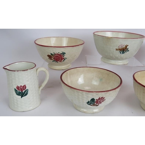 176 - Five 19th century relief moulded spongeware bowls, one with bird motif, and two similar jugs. Larges... 