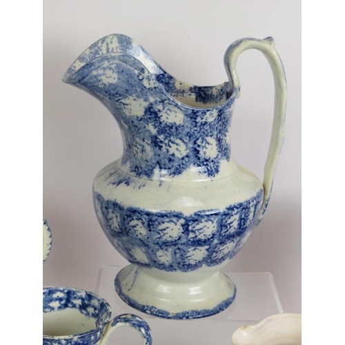 177 - Ten mainly 19th century blue and white Spongeware pottery jugs, tallest 24cm. (10).
Condition report... 