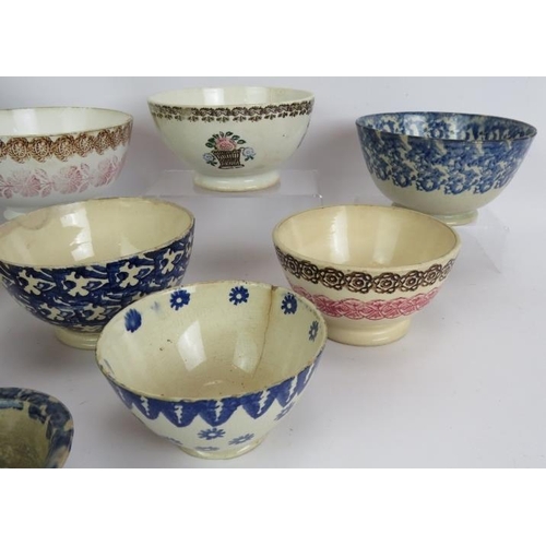 179 - Ten mainly 19th century Spongeware pottery bowls of varying size and pattern. Largest 18cm diameter.... 