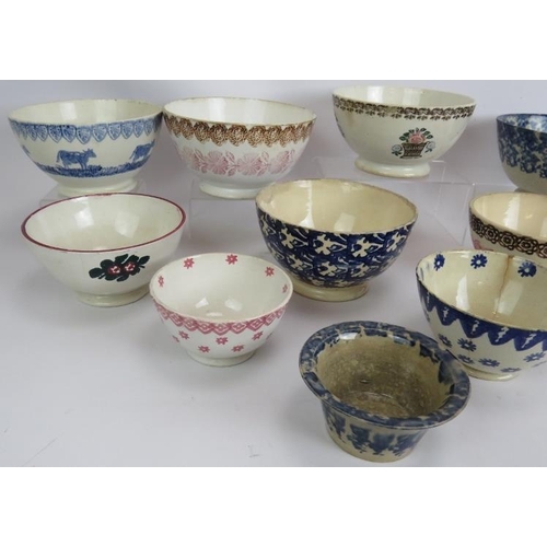 179 - Ten mainly 19th century Spongeware pottery bowls of varying size and pattern. Largest 18cm diameter.... 