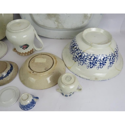 180 - A mixed lot of antique and later Spongeware pottery including two platters, dishes, jugs, egg cups e... 