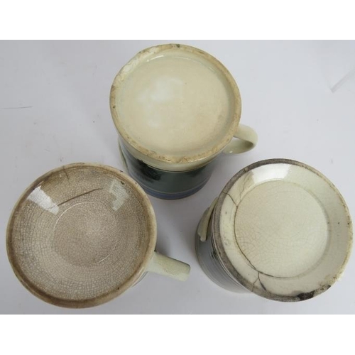 191 - Three mid 19th century Mocha ware half pint mugs, a similar 20th century bowl, a Victorian loving cu... 