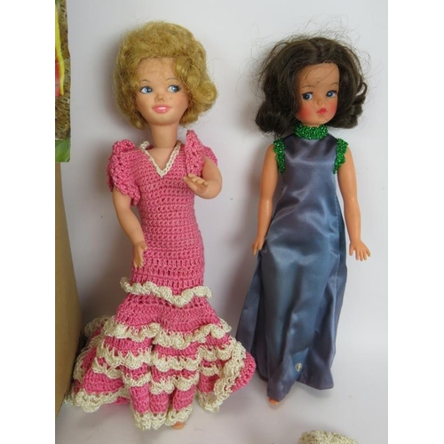 196 - A large box full of 1970s handmade Cindy Doll outfits with some patterns and two Cindy dolls, one ma... 