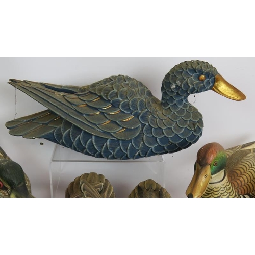 198 - Twenty hand painted carved wood decoy style ducks of varying size and colours. Largest 40cm long. (2... 