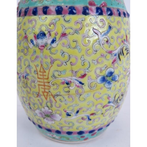 2 - A Chinese porcelain covered jar decorated in the Famille Jaune palette, signed to lid and rim. Heigh... 