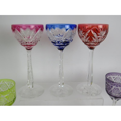 201 - Ten mixed Bohemian glass flash cut wine glasses of varying colour and style. Tallest 20cm. (10).
Con... 