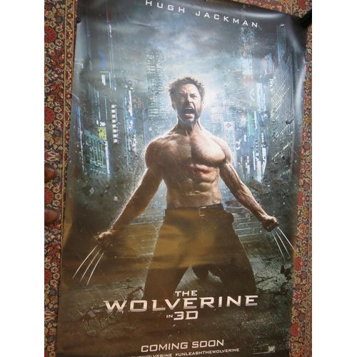 214 - A large vinyl film poster for the movie The Wolverine in 3D. 242cm x 153cm.
Condition report: Some c... 