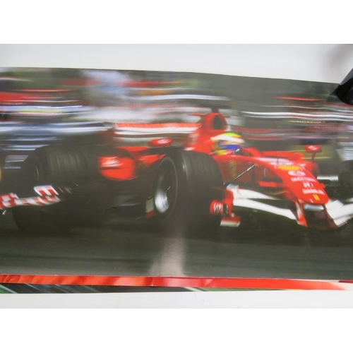 217 - A collection of mainly Formula 1 promotional posters and signed sheets including Kimi Raikkonen and ... 