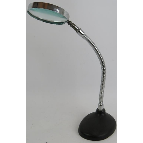 228 - A Hilkinson chrome swan neck desk magnifier with black cast iron base. 
Condition report: No issues.