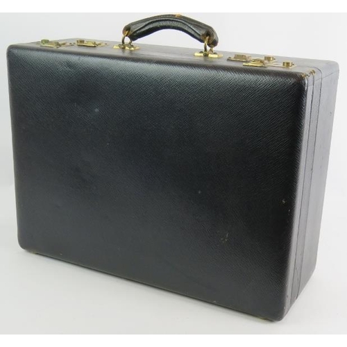 230 - A vintage black leather two section vanity travel case, fully lined and fitted. Keys present. 50cm x... 