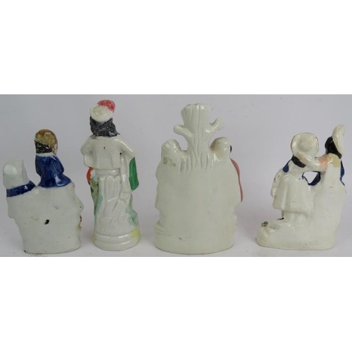 238 - Four 19th century Staffordshire pottery flat back figurines and a Coalport figurine of Paddington Be... 