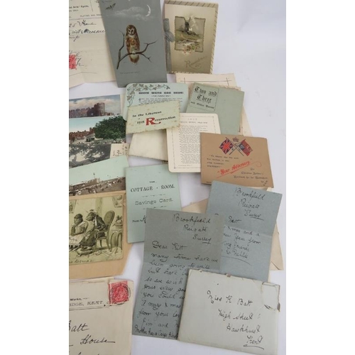 243 - A collection of early 20th century Christmas, greetings and memorial cards along with some local pos... 