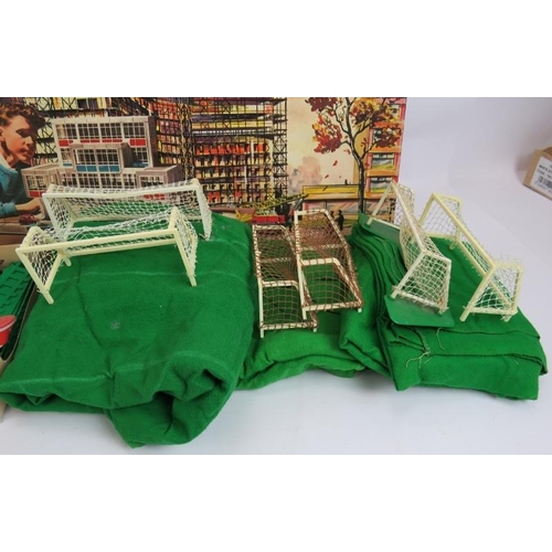 247 - A quantity of vintage Subbuteo teams, pitches and accessories including 10 teams, three pitches, goa... 