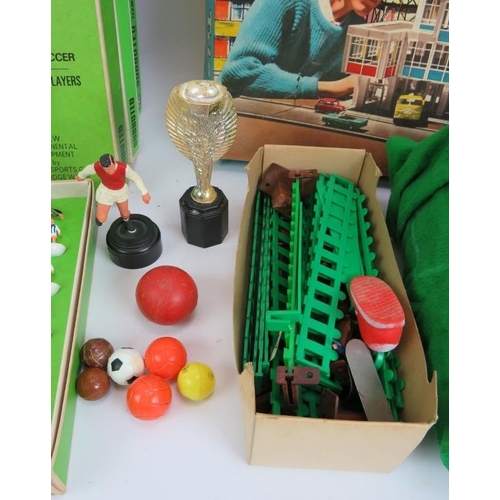 247 - A quantity of vintage Subbuteo teams, pitches and accessories including 10 teams, three pitches, goa... 