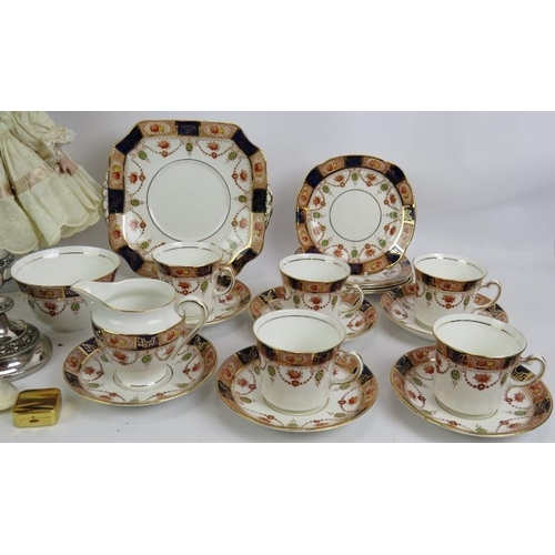 261 - A Colclough China part tea set, a pair of silver plated candlesticks, pair of plated bon bon dishes,... 