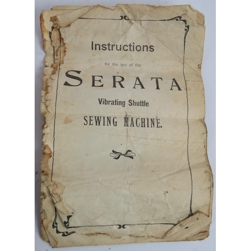 262 - A vintage Serata manual sewing machine with wooden case, key and instructions.
Condition report: Unt... 