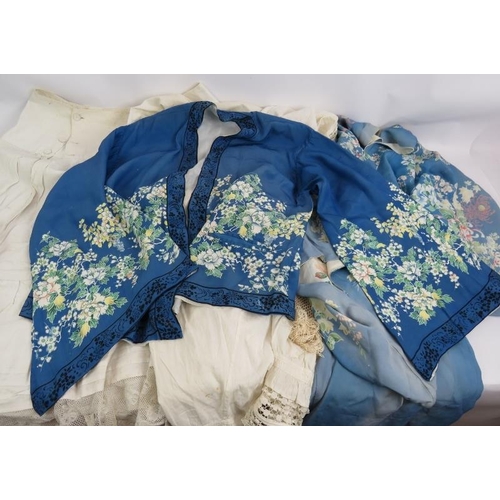 265 - A vintage printed Kimono style robe, a similar Kimono style jacket, a cotton and lace petticoat, a s... 