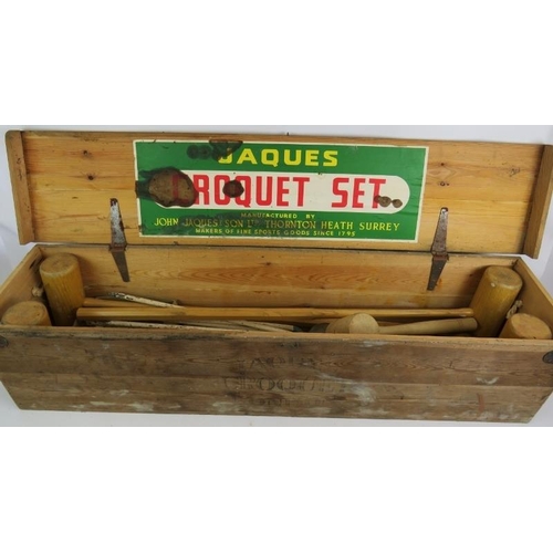 270 - A Jaques & Sons full size croquet set in box, complete with four mallets, four balls, six hoops etc.