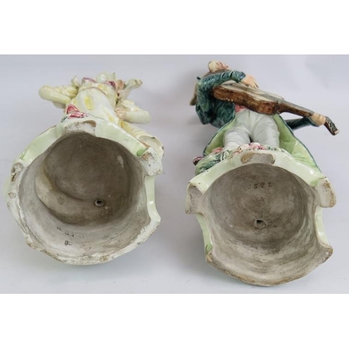 274 - A pair of 19th century continental Majolica figurines of a lady and a minstrel. Both with incised ma... 