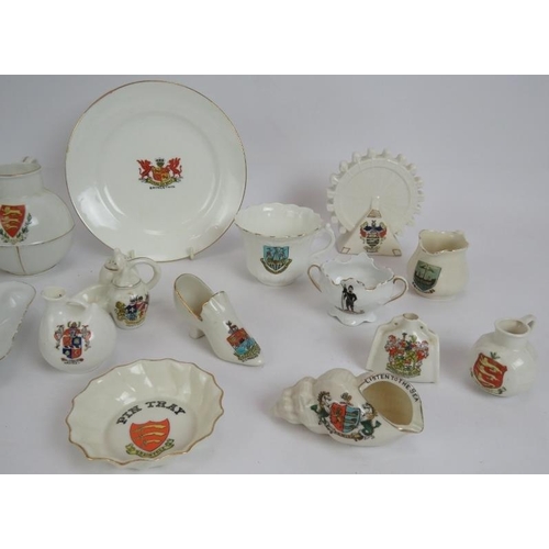 275 - A collection of early 20th century crested ware including the Blackpool big wheel. Maker's including... 