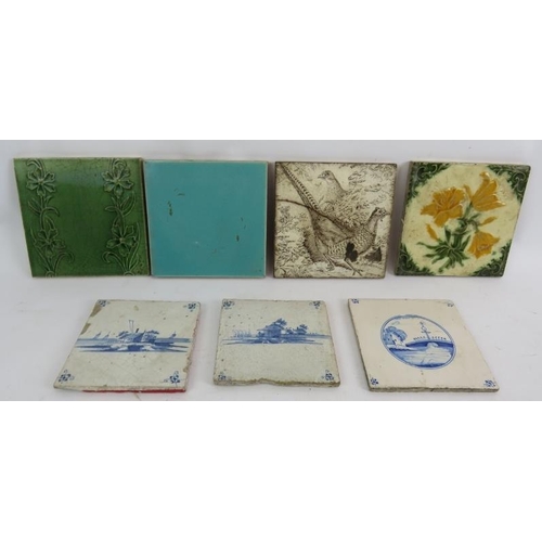 283 - Three 18th/19th century blue and white Delft tiles, an aesthetic movement pheasant design Josiah Wed... 