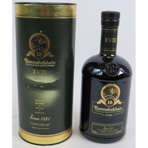 297 - One bottle of Bunnahabhain single Islay malt scotch whisky, 18 year old, 70cl, 43% vol. With tube.
C... 