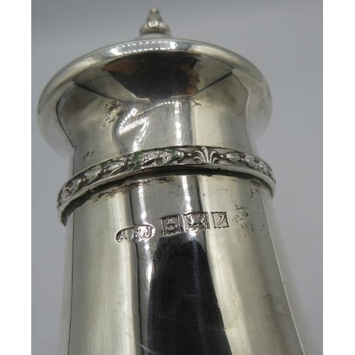 316 - A silver sugar caster with flower motif, Birmingham 1958, A.E Jones. Approx 7