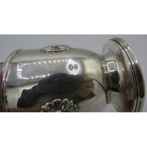 316 - A silver sugar caster with flower motif, Birmingham 1958, A.E Jones. Approx 7