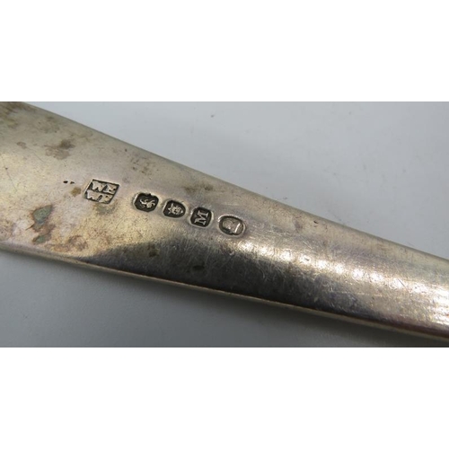 317 - A Georgian silver basting spoon, London 1807, William Eley & William Fearn, monogrammed.
Condition r... 