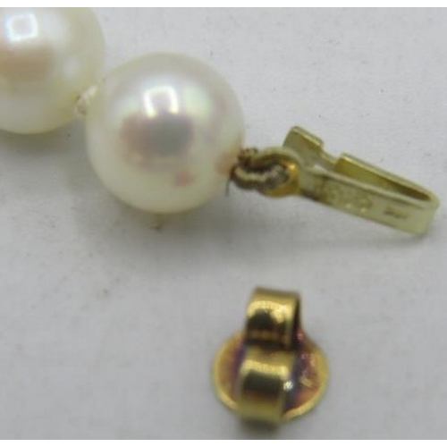 323 - A pearl necklace interspersed with 9 faceted citrine stones and 18 yellow metal spacers. 14ct yellow... 