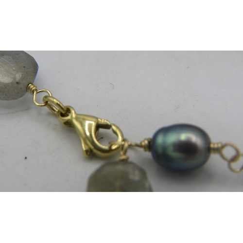 328 - A delicate pear aquamarine and labradorite necklace with 18ct yellow gold lobster clasp, each bead j... 