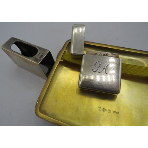 353 - A small silver box with hinged lid, monogrammed GA. London 1936, A silver cigarette case with gilded... 