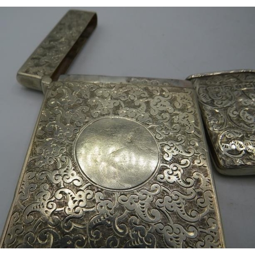 355 - An engraved silver card case with hinged lid. Birmingham 1899 and an engraved silver pocket card cas... 