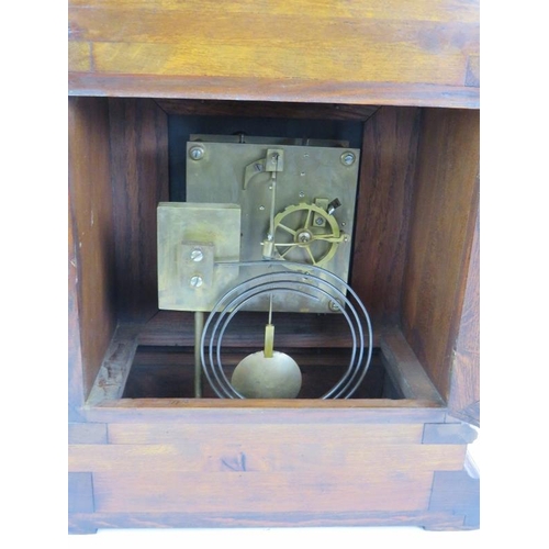 37 - An Edwardian oak cased Palladian style mantel clock with striking movement. Pendulum present. No key... 