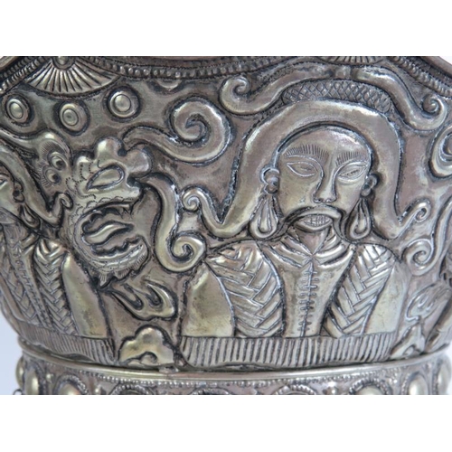 41 - A Chinese white metal ceremonial crown shaped hat with phoenix and dragon repousse decoration. Bespo... 