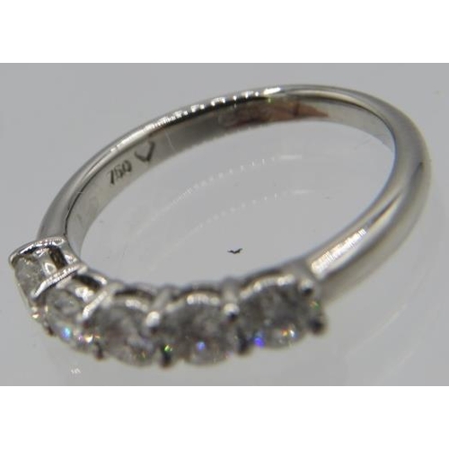 420 - An 18ct white gold 5 stone diamond ring. Round brilliant cut diamond. 0.93 ct. Size L. 3.4 grams.
Co... 