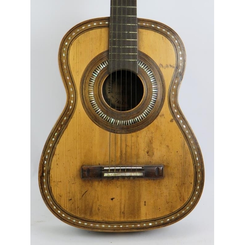 46 - A late 19th century inlaid Spanish guitar bearing a label for Alejandro Roca Y Hermanos, Valencia. L... 