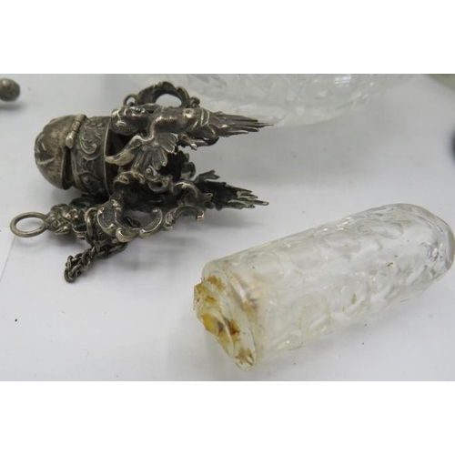 480 - A large hobnail cut Victorian scent bottle with unusual silver collar with attached hinged lid. Appr... 